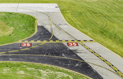 Aviation safety at a glance Centerlines and other navigational markings by corner of runway at a small civilian airport